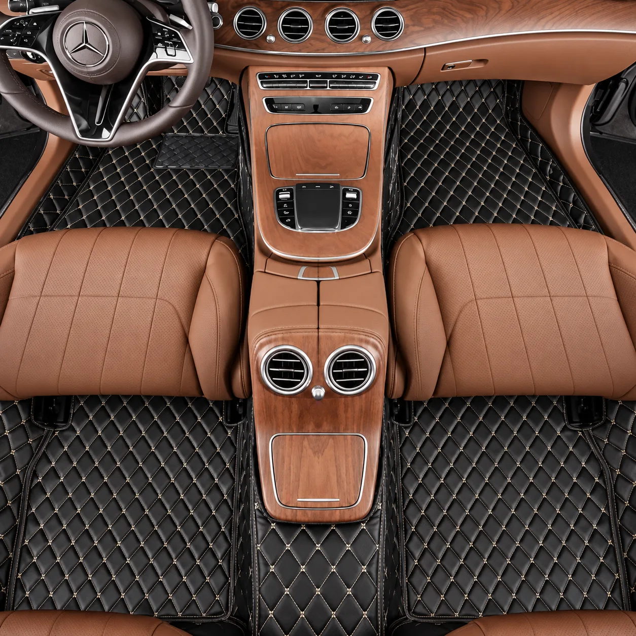 full custom black diamond quilted car floor mats in luxury brown leather car interior, top view