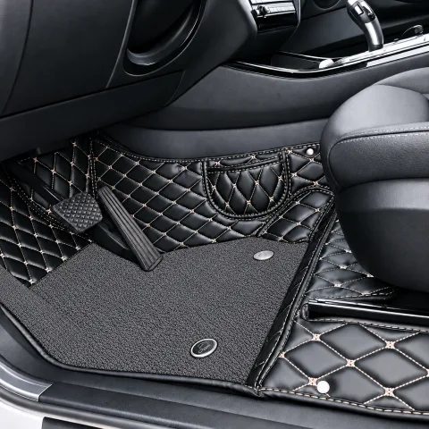 double layer car floor mats, black diamond quilted base with dark grey carpet upper layer, installed in car
