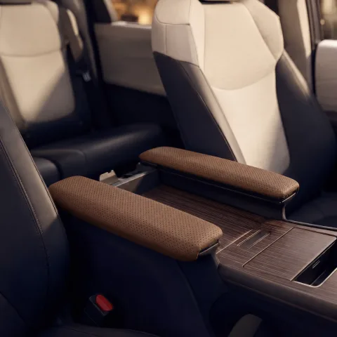 Sienna car armrest cover in brown leather, installed on center console, real photo